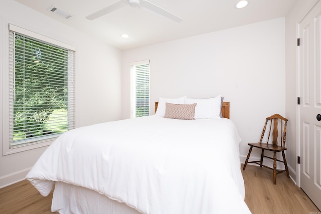 6600 Waverly Dr, Little Rock, AR 72207 - bedroom with recessed lighting, multiple windows, visible vents, and light wood-style flooring