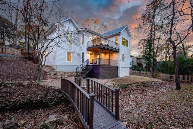 6600 Waverly Dr, Little Rock, AR 72207 - traditional-style house with stairway, fence, and a balcony