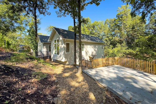 6600 Waverly Dr, Little Rock, AR 72207 - view of property exterior featuring fence and a deck