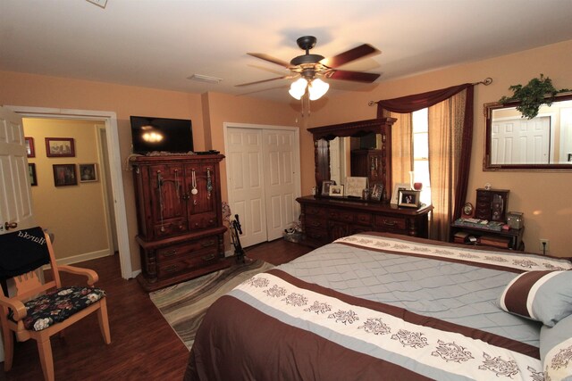 1111 Willow St, Sheridan, AR 72150 - bedroom featuring a closet, ceiling fan, dark wood finished floors, baseboards, and visible vents