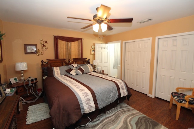 1111 Willow St, Sheridan, AR 72150 - bedroom with wood finished floors, visible vents, a ceiling fan, and multiple closets