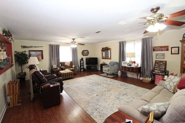 1111 Willow St, Sheridan, AR 72150 - living area featuring ornamental molding, a ceiling fan, wood finished floors, and visible vents