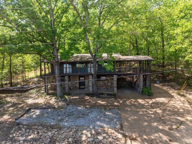 exterior space with a forest view