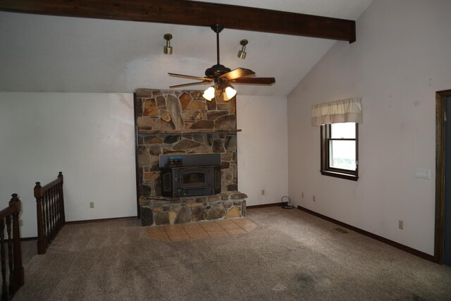 unfurnished living room with lofted ceiling with beams, baseboards, ceiling fan, and carpet