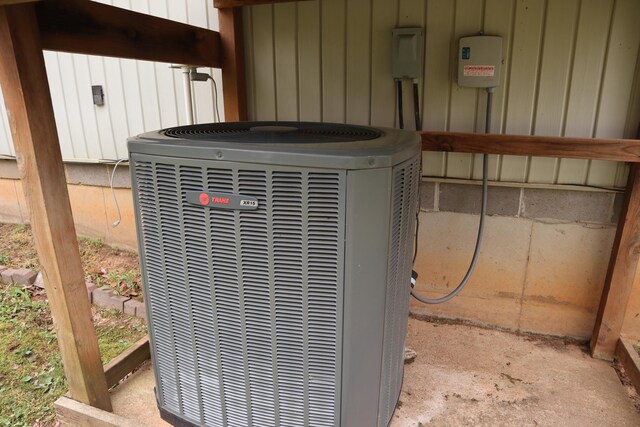 details with cooling unit and board and batten siding