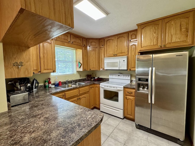 168 Knob Creek Rd, Melbourne, AR 72556 - kitchen featuring dark countertops, a sink, brown cabinetry, light tile patterned flooring, and white appliances