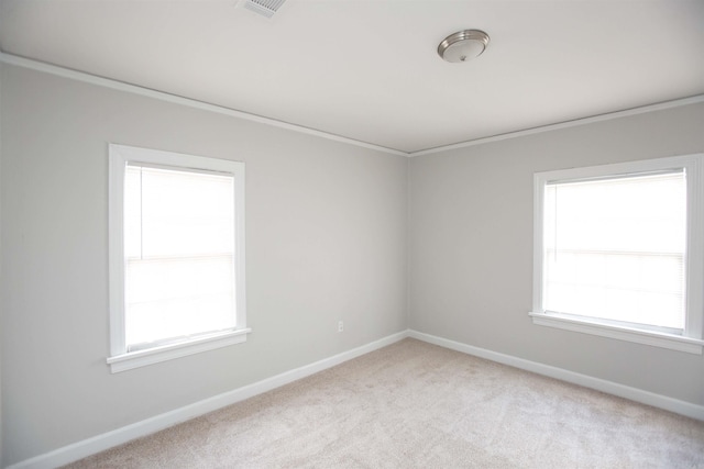 2713 S Van Buren St, Little Rock, AR 72204 - unfurnished room with carpet floors, baseboards, and plenty of natural light