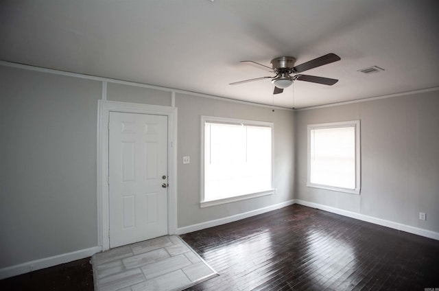 2713 S Van Buren St, Little Rock, AR 72204 - foyer featuring baseboards, visible vents, a ceiling fan, hardwood / wood-style flooring, and ornamental molding