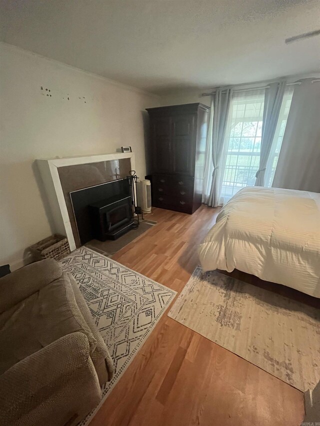 bedroom with wood finished floors