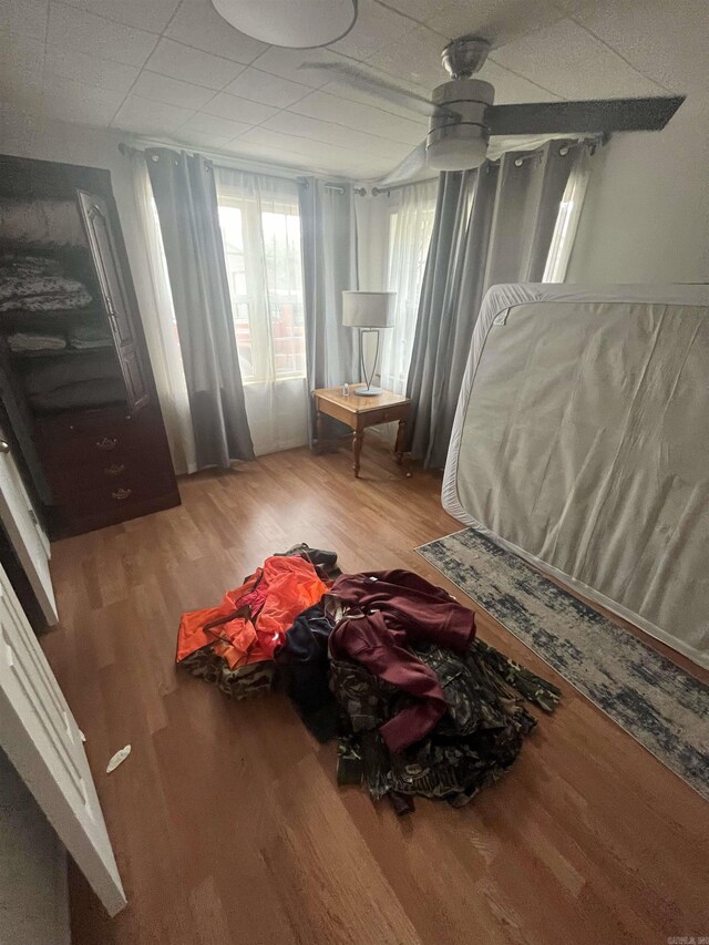 bedroom featuring wood finished floors