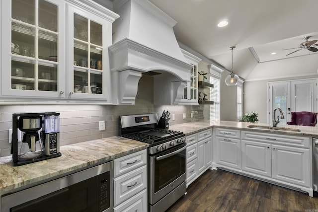 14812 Pride Valley Rd, Little Rock, AR 72223 - kitchen with a ceiling fan, a sink, white cabinets, appliances with stainless steel finishes, and light stone countertops