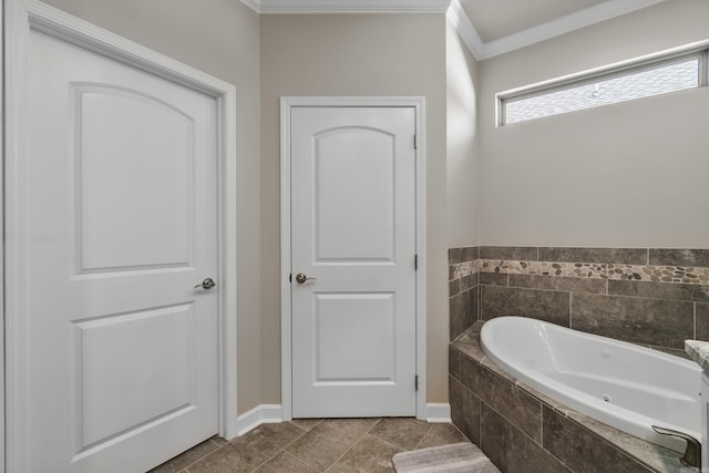 14812 Pride Valley Rd, Little Rock, AR 72223 - bathroom featuring baseboards, ornamental molding, and a tub with jets