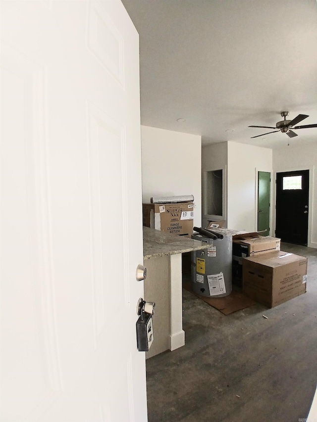 kitchen with open floor plan and a ceiling fan