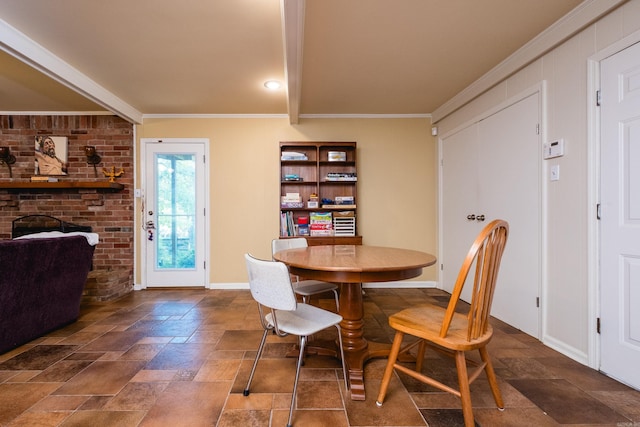 7 Sandstone Ct, Little Rock, AR 72227 - dining room featuring baseboards, crown molding, and stone tile floors