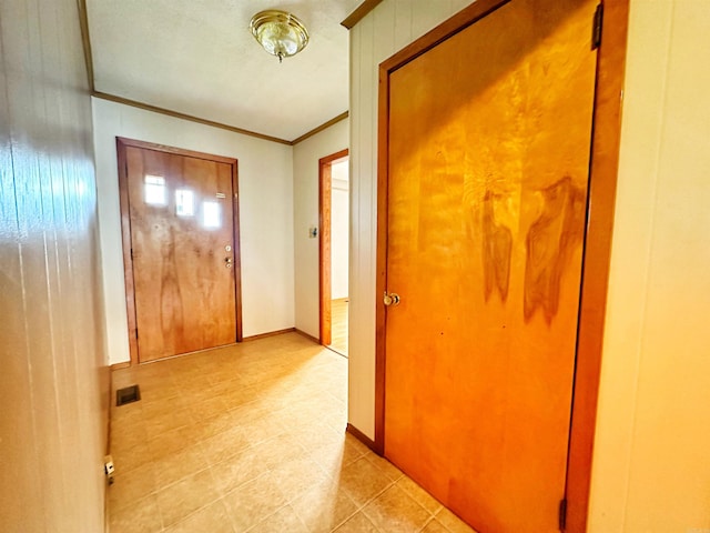 40 Sutton Ln, Batesville, AR 72501 - entryway with baseboards, visible vents, light tile patterned floors, and crown molding