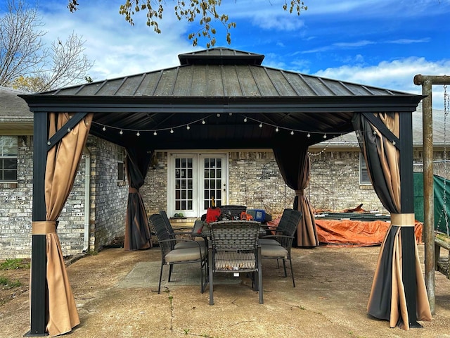 40 Sutton Ln, Batesville, AR 72501 - view of patio / terrace with outdoor dining area, french doors, and a gazebo