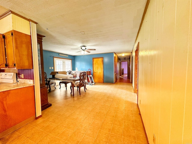 40 Sutton Ln, Batesville, AR 72501 - dining room with a ceiling fan, wood walls, and a textured ceiling