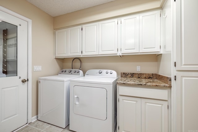 laundry room with washer and dryer and cabinet space