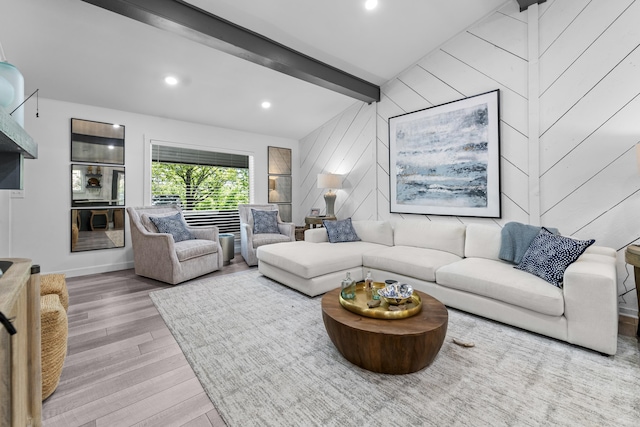 living area featuring wood walls, wood finished floors, beam ceiling, and recessed lighting