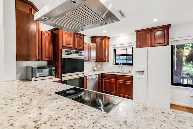 2312 Breckenridge Dr, Little Rock, AR 72227 - kitchen with range hood, a sink, decorative backsplash, appliances with stainless steel finishes, and light stone countertops