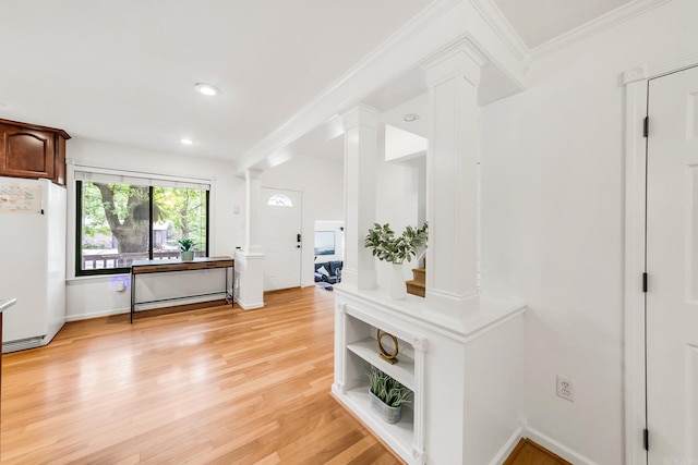 2312 Breckenridge Dr, Little Rock, AR 72227 - interior space featuring light wood-style floors, decorative columns, baseboards, ornamental molding, and recessed lighting