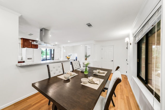 2312 Breckenridge Dr, Little Rock, AR 72227 - dining space featuring baseboards, recessed lighting, visible vents, and light wood-type flooring