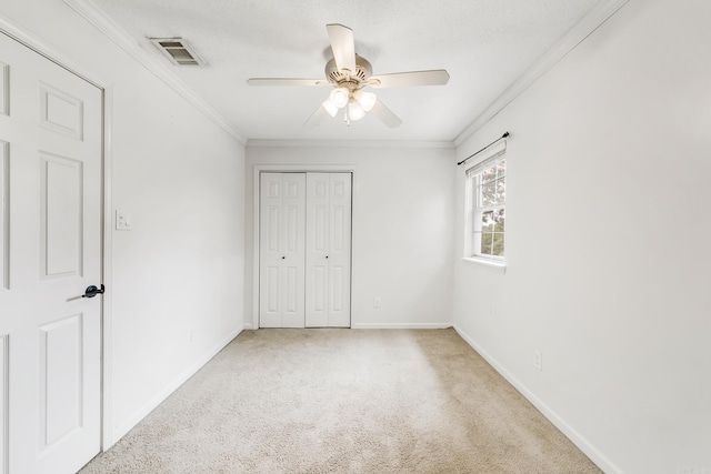 2312 Breckenridge Dr, Little Rock, AR 72227 - unfurnished bedroom featuring baseboards, visible vents, ornamental molding, and light colored carpet
