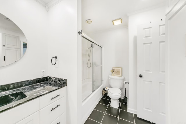 2312 Breckenridge Dr, Little Rock, AR 72227 - bathroom featuring tile patterned flooring, combined bath / shower with glass door, toilet, vanity, and crown molding