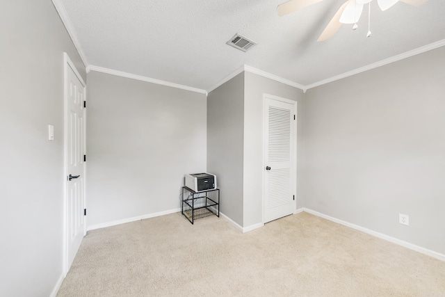 2312 Breckenridge Dr, Little Rock, AR 72227 - unfurnished room featuring carpet floors, visible vents, crown molding, and ceiling fan