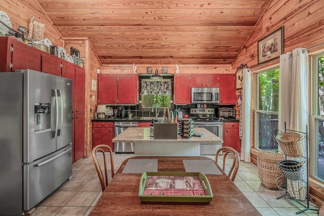 kitchen with wooden ceiling, lofted ceiling, stainless steel appliances, and light tile patterned floors
