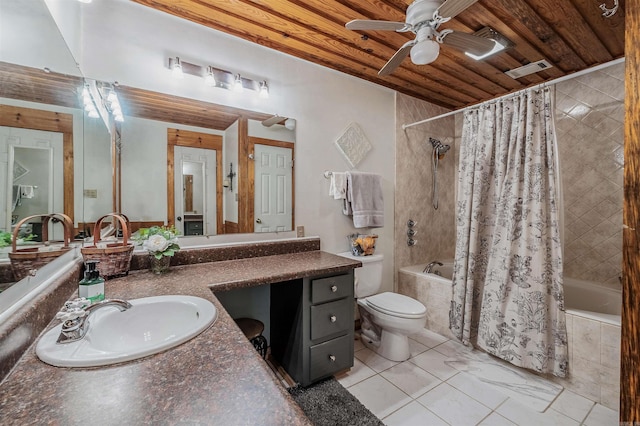bathroom with tiled shower / bath, toilet, vanity, wooden ceiling, and ceiling fan