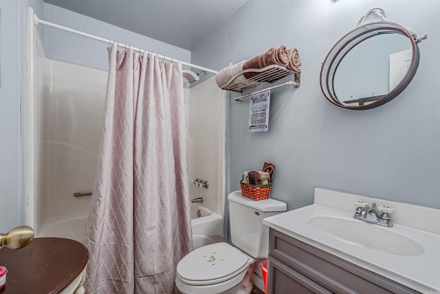 bathroom with shower / tub combo, toilet, and vanity