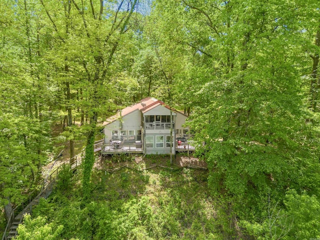 exterior space with a forest view