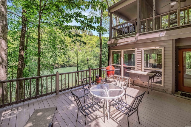 deck featuring outdoor dining area