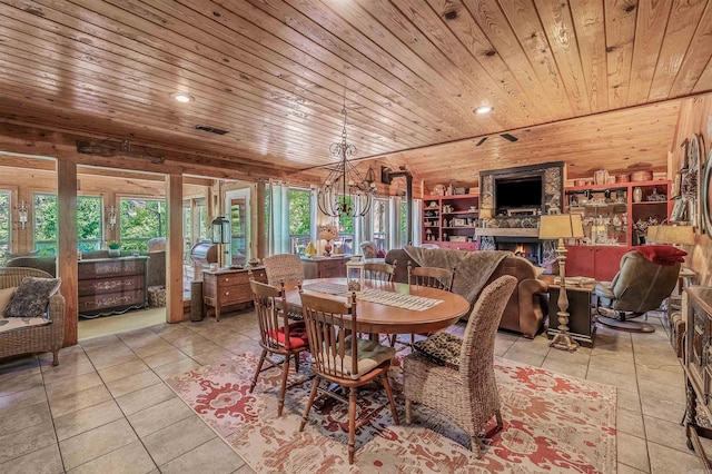 dining room featuring plenty of natural light, wooden ceiling, visible vents, and an inviting chandelier