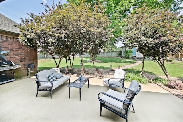 26 Shiloh S, Cabot, AR 72023 - fenced backyard featuring a patio, outdoor lounge area, and area for grilling