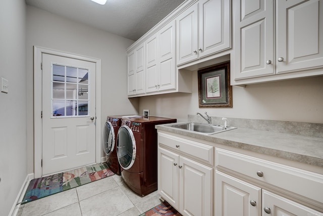 505 Fieldstone, Conway, AR 72034 - laundry area featuring cabinet space, a sink, separate washer and dryer, baseboards, and light tile patterned floors
