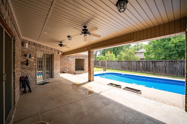 505 Fieldstone, Conway, AR 72034 - view of swimming pool with a patio, ceiling fan, a fenced in pool, and a fenced backyard
