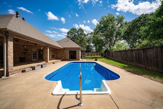 505 Fieldstone, Conway, AR 72034 - view of pool with a fenced backyard, a ceiling fan, a fenced in pool, and a patio area
