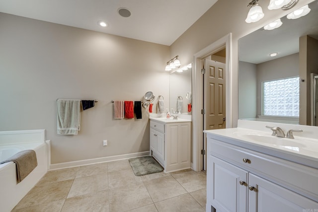 505 Fieldstone, Conway, AR 72034 - full bath featuring baseboards, a sink, a bath, and two vanities