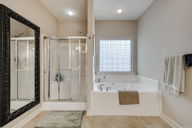 505 Fieldstone, Conway, AR 72034 - bathroom featuring tile patterned flooring, a shower stall, and a garden tub