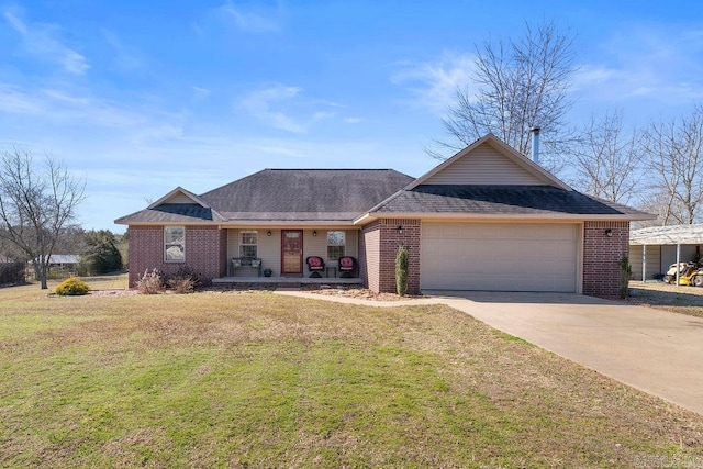 ranch-style house with a front lawn, concrete driveway, brick siding, and a garage