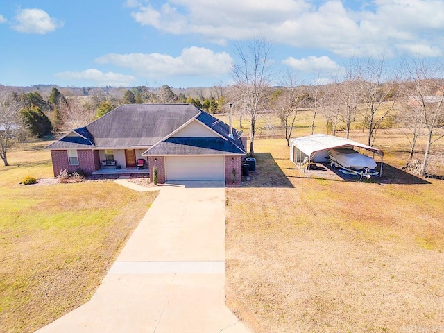 ranch-style home with covered porch, brick siding, a garage, driveway, and a front yard