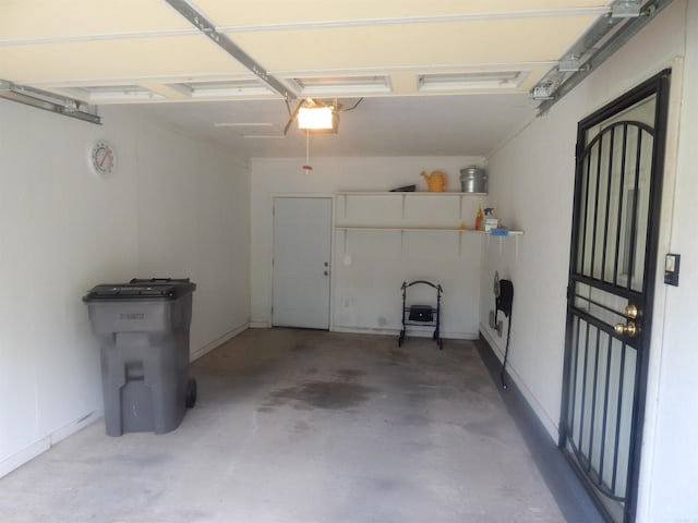 garage featuring a garage door opener