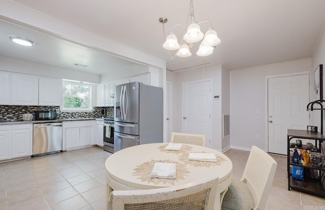 8033 Renee Cir, Benton, AR 72019 - dining room with light tile patterned floors, visible vents, and a chandelier