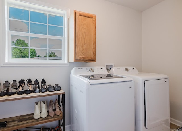 8033 Renee Cir, Benton, AR 72019 - laundry area with washing machine and clothes dryer and cabinet space
