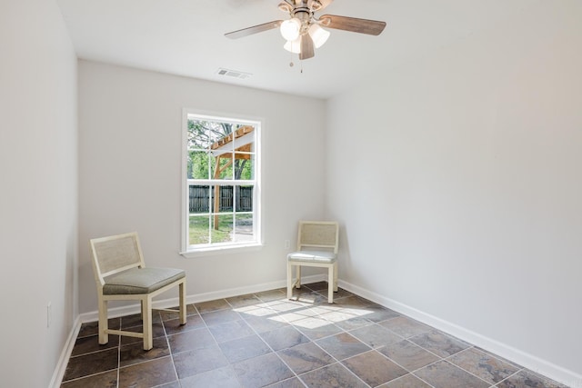 8033 Renee Cir, Benton, AR 72019 - living area with baseboards, visible vents, stone finish flooring, and ceiling fan