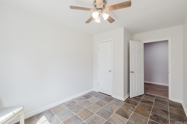 8033 Renee Cir, Benton, AR 72019 - unfurnished bedroom featuring ceiling fan and baseboards