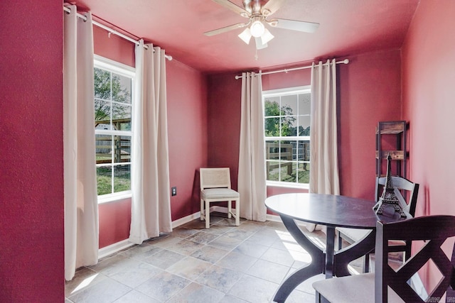 8033 Renee Cir, Benton, AR 72019 - dining area featuring ceiling fan and baseboards