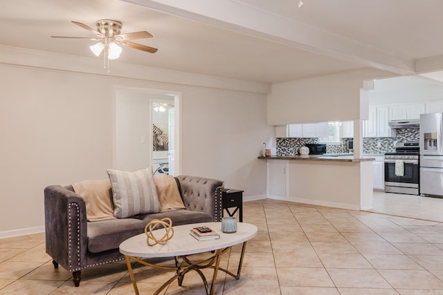 8033 Renee Cir, Benton, AR 72019 - living area with baseboards, beamed ceiling, a ceiling fan, and light tile patterned flooring